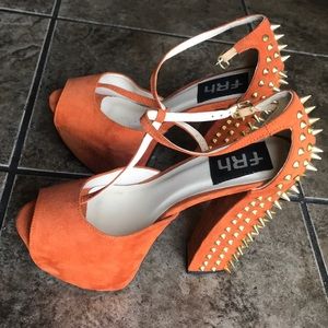 Orange studded heels